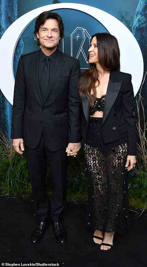 Black-clad couple: Jason wore an all-black suit