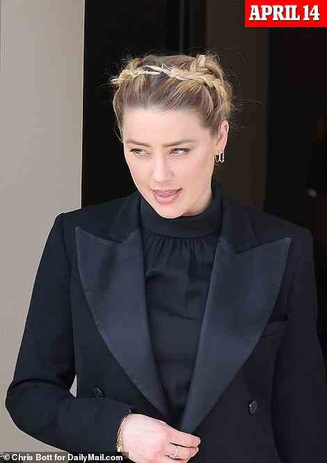 Amber Heard has been accused of copying Johnny Depp's courtroom outfits, as viewers spot multiple similarities between their ensembles. Heard is pictured at court on April 14