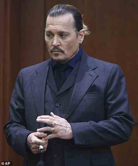 Some people are convinced that Heard is purposely picking outfits that look similar to ones that Depp (pictured on April 21) has previously worn during the trial, in an attempt to 'play mind games' on him.