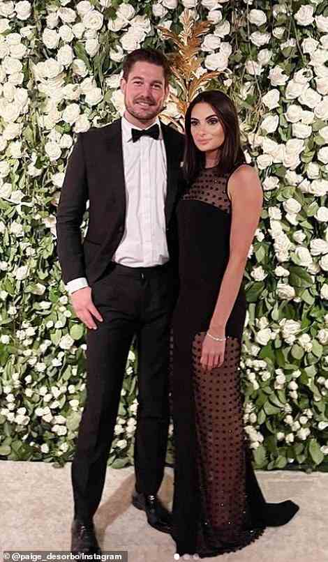 Guests were invited to pose in front of a large flower wall at the ceremony, with Paige, 29, and her boyfriend and fellow Bravo star Craig Conover taking full advantage (pictured) as did Emily and Sami Saifan