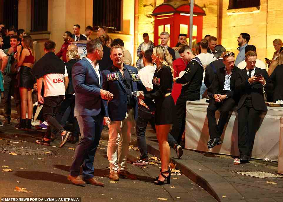 Uniformed servicemen and woman mingled with each other (pictured) and civilians in The Rocks in Sydney
