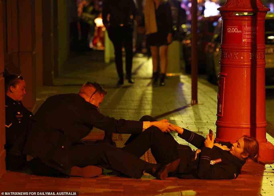 Some of those in uniform were seen relaxing in the street outside one venue as the night drew to a close