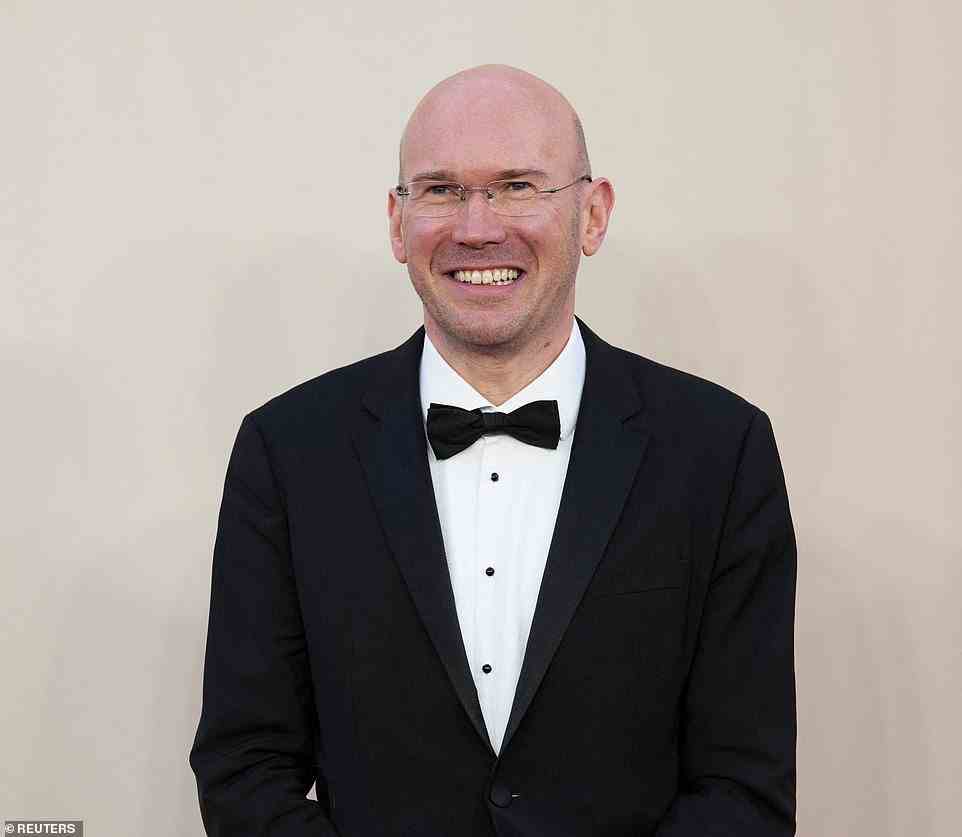 Star-studded: The Thick of It star Alex Macqueen looked sharp in a black tuxedo as he arrived at the Downton premiere