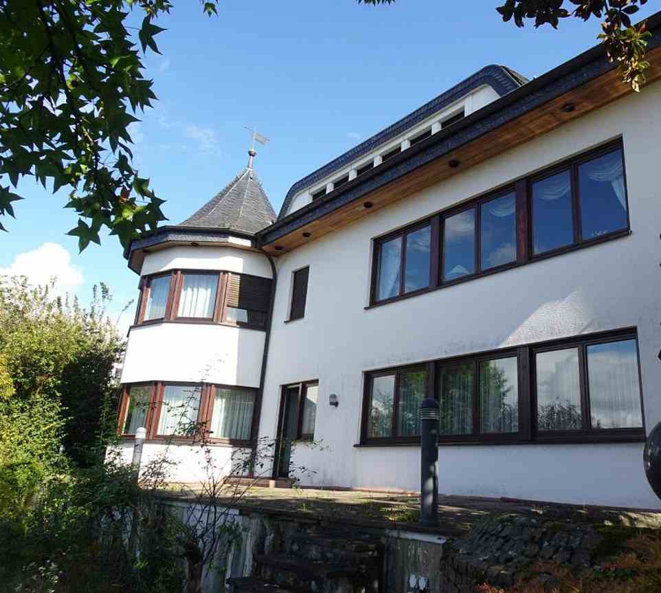 He was also convicted of trying to conceal the ownership of his £1.8million villa (pictured) 'Im Schilling' in his native Leimen, Germany, as well as his ownership of 75,000 Data Corp shares
