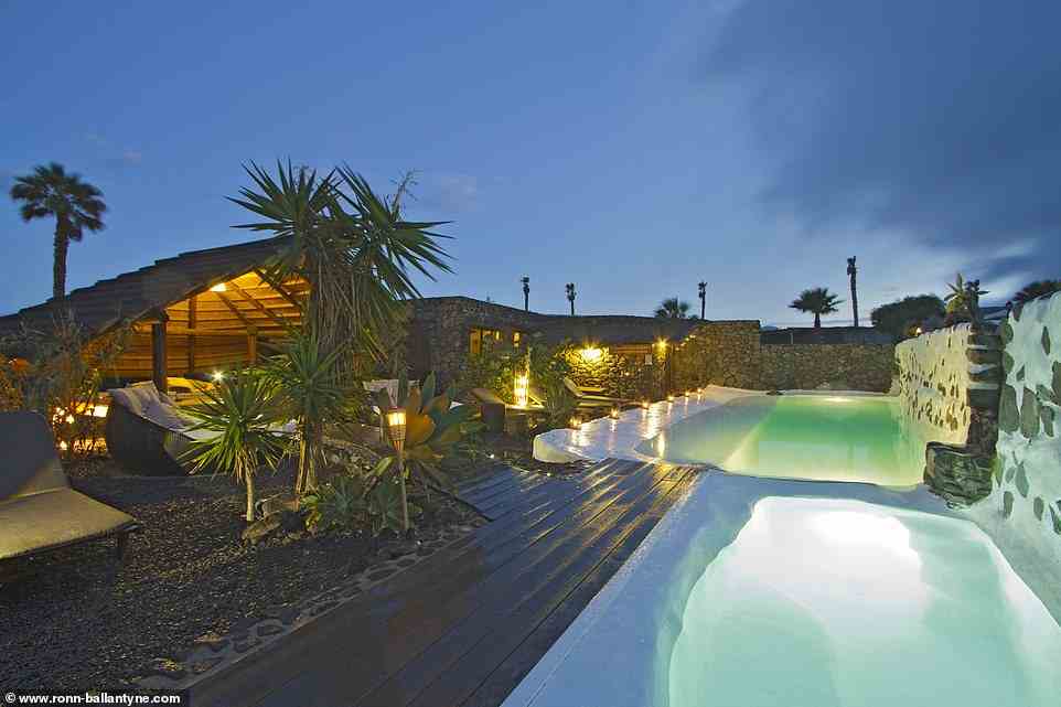 Stay in the yurts or cottages at the eco retreat of Finca Arrieta, pictured, in the rugged north of Lanzarote