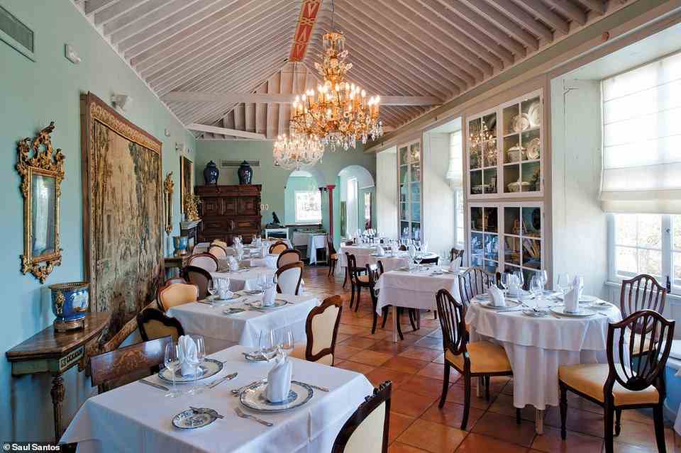 Stay on a former sugar cane estate at the 17th Century Hacienda de Abajo on La Palma. Above is the hotel's charming restaurant