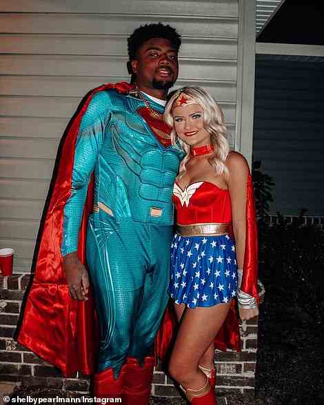 The couple dressed as Superman and Wonder Woman for Halloween