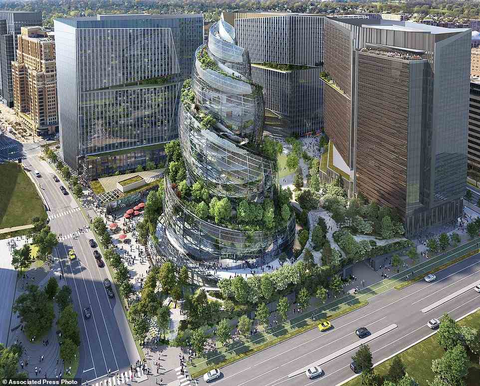 Eine Darstellung des neuen spiralförmigen Gebäudes von Amazon in seinem bevorstehenden zweiten Hauptsitz in Arlington, Virginia.  Das Gebäude verfügt über eine Rampe um seine Außenseite, die als von Bäumen gesäumte Wanderung genutzt werden kann