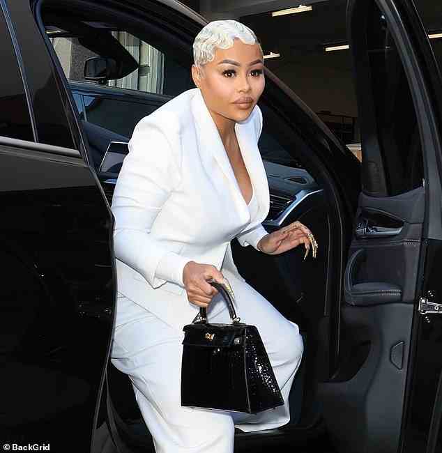 Reality TV star Blac Chyna, pictured entering court on Friday, was accused again of pulling a gun up to her ex-fiancé Rob Kardashian's head in 2016