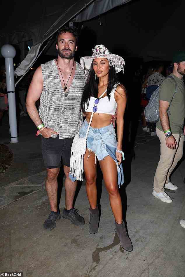 Toned: Nicole Scherzinger showcased her toned frame as she posed up with beau Thom Evans at day one of Coachella in Indio, California on Saturday