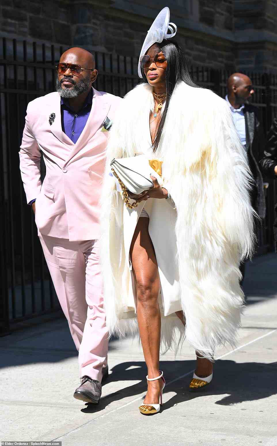 A host of stars came together to pay tribute to the late style icon Andre Leon Talley in New York on Friday, including Naomi Campbell, who wore an incredibly flashy outfit comprised of an enormous, white fur coat, which left her long legs on full display, and a jutting head piece which would ensure all eyes were on her
