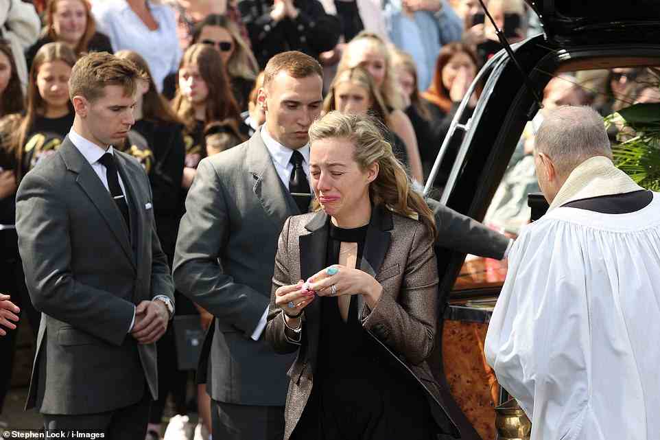 Saying goodbye: Tom Parker 's widow Kelsey broke down in tears after paying tribute to her 'soulmate' at the popstar's funeral in south-east London on Wednesday