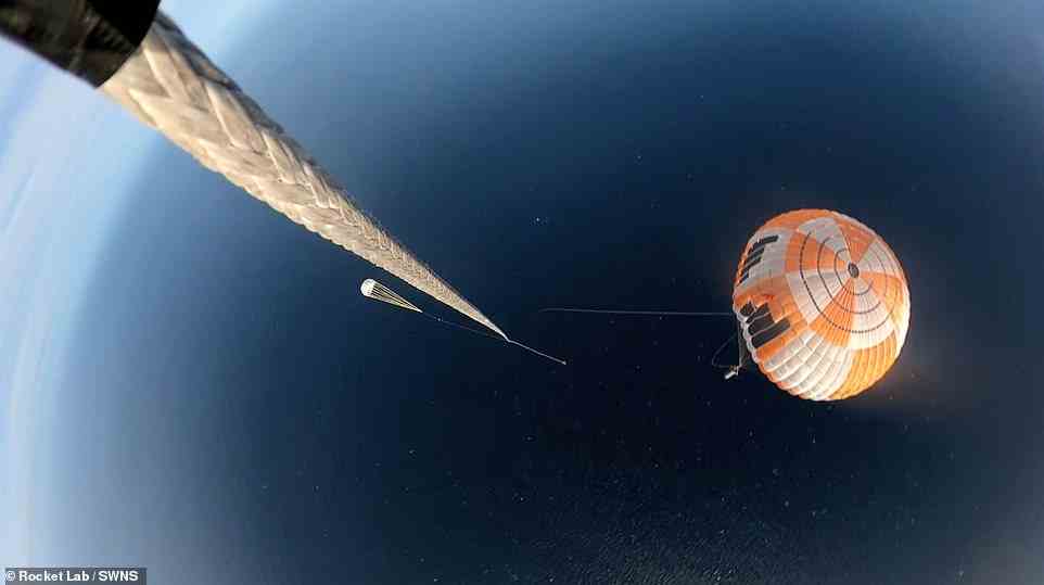 A hook mounted on a helicopter will be used to latch onto the rocket's parachute as it slows from speeds of 5,000 mph (8,000 kph) to a mere 22 mph (35 kph) above the Pacific Ocean