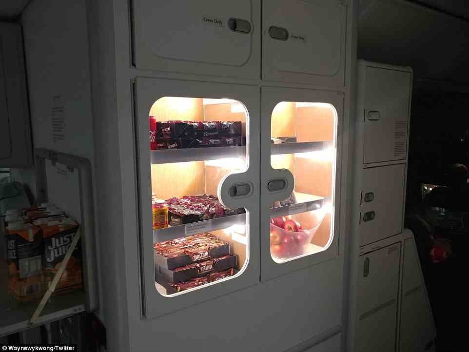 Passengers on board shared photos of the specially crafted menu, complimentary amenity bags and the self-serve pantry, loaded with free snacks and drinks (pictured)