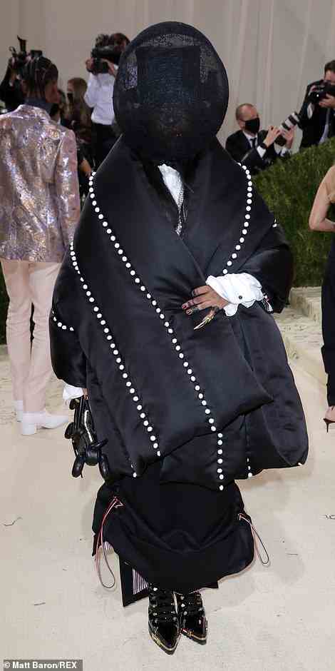 Erykah Badu wore Thom Browne at last year's event, accessorizing a blanket-like dress with a top hat and veil