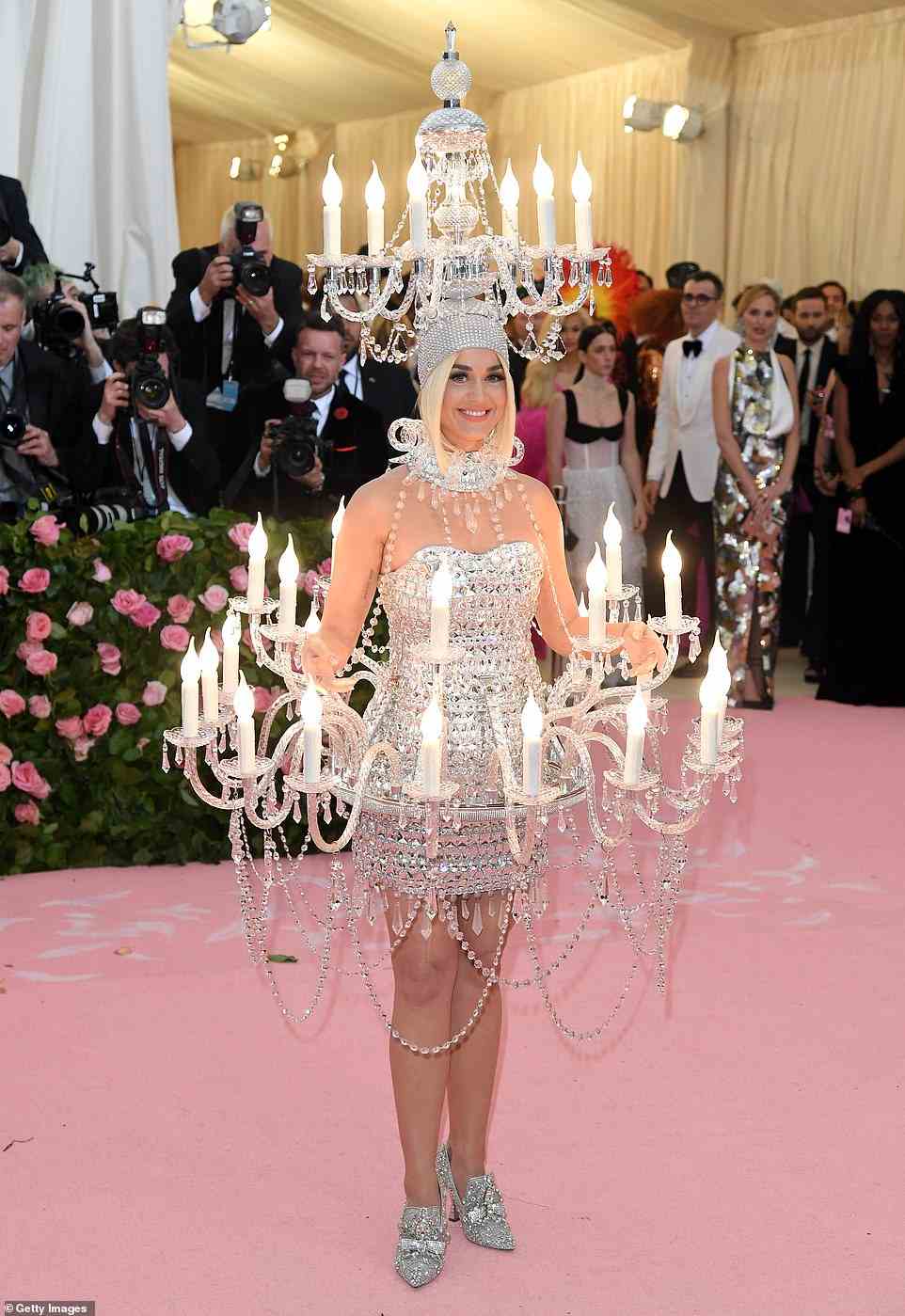 The Met Gala was especially over-the-top in 2019 in keeping with the 'Camp' theme - and few do camp quite like Katy Perry, who worked with Jeremy Scott for Moschino to create this chandelier dress and matching headpiece