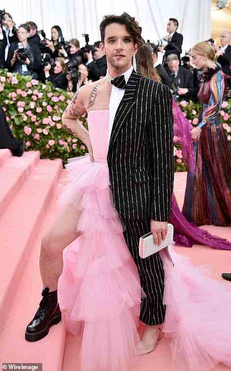 Michael Urie was his own prom date in a custom Christian Siriano that was half fluffy pink dress, half pinstripe tuxedo