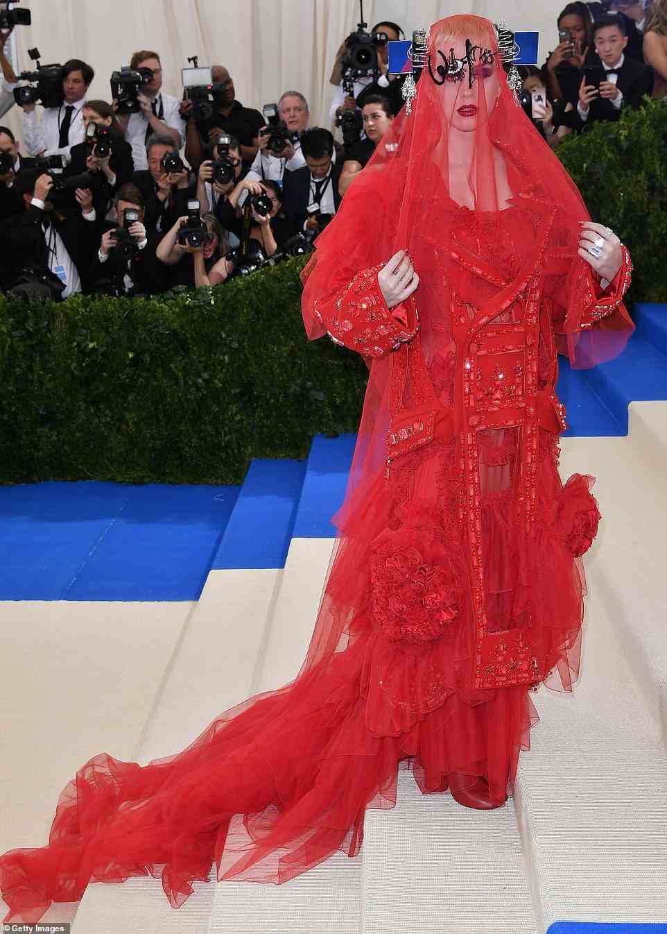 Katy Perry has always gone above and beyond in order to make a statement on the red carpet at the Met Gala - and her Maison Margiela Artisanal design for 2017 was no exception