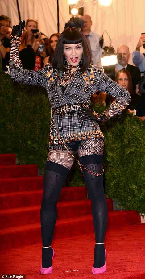 Never one to go understated, Madonna embraced 2013's punk theme in a pantless plaid look with lots of studs