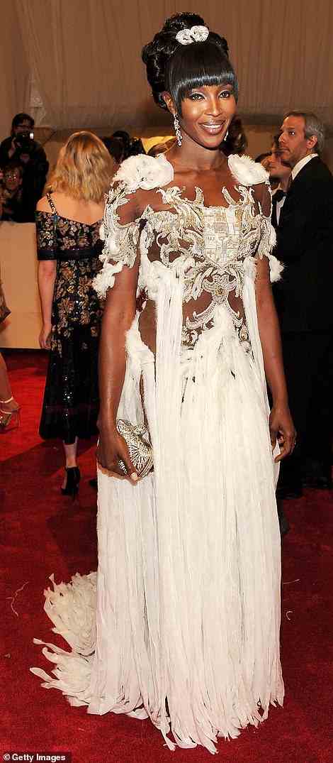 For 'Alexander McQueen: Savage Beauty,' Naomi Campbell wore a stunning white gown by the late designer
