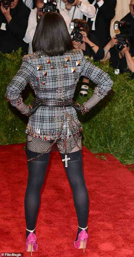 Never one to go understated, Madonna embraced 2013's punk theme in a pantless plaid look with lots of studs