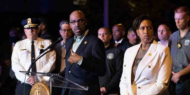 From left, Chief Robert Contee III and Mayor Muriel Bowser speak to the media at the scene of an active shooting in Washington, D.C. on Friday, April 22, 2022. 