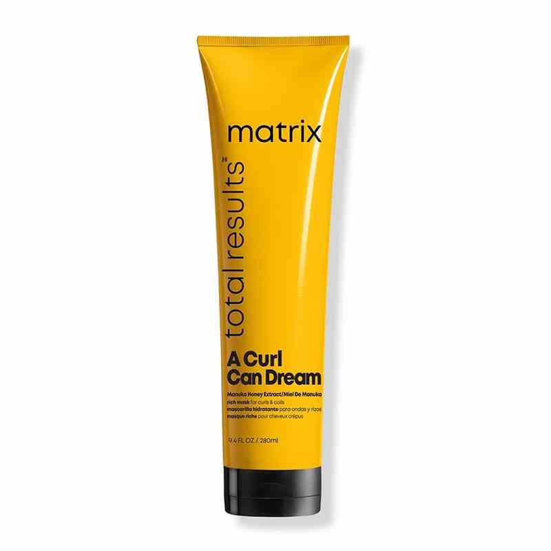 A yellow tube of the Matrix A Curl Can Dream Rich Mask on a white background