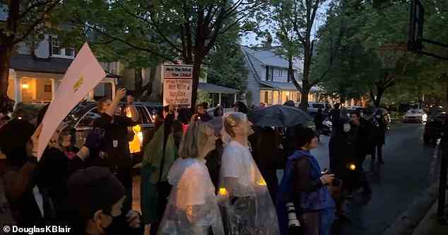 Protesters gathered outside Justice Brett Kavanaugh's house on Saturday, screaming: 'We will not go back!'