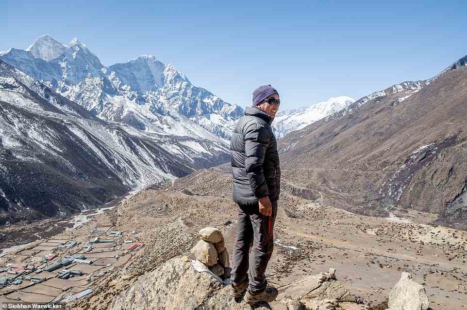 Gelu Sherpa is pictured here above the village of Dingboche on an acclimatisation day-hike to Nagarzhang Peak