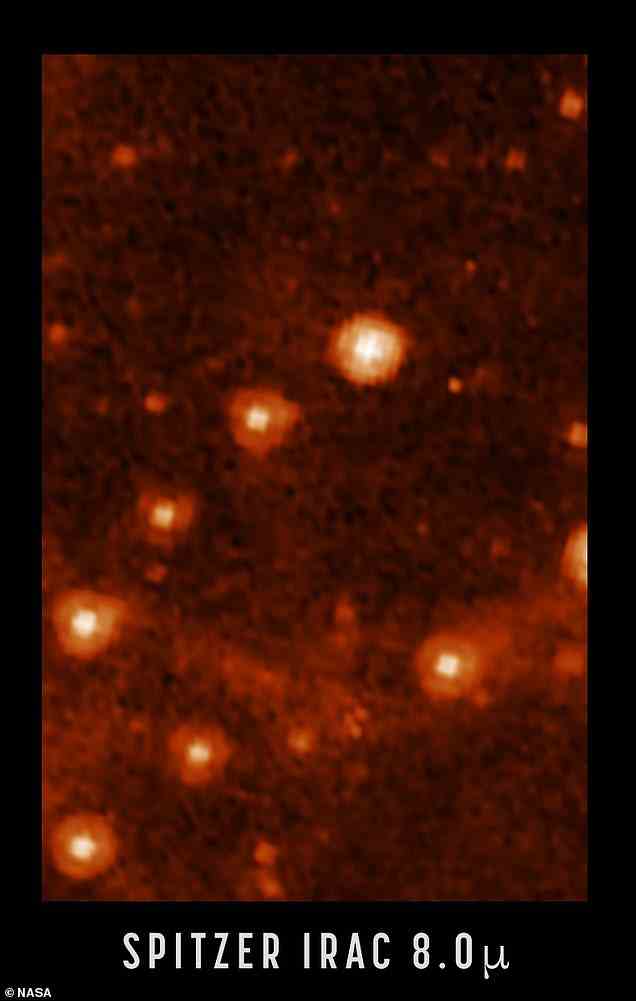 Das Spitzer-Bild zeigt eine Unschärfe von etwa sieben nahen Sternen in der Großen Magellanschen Wolke