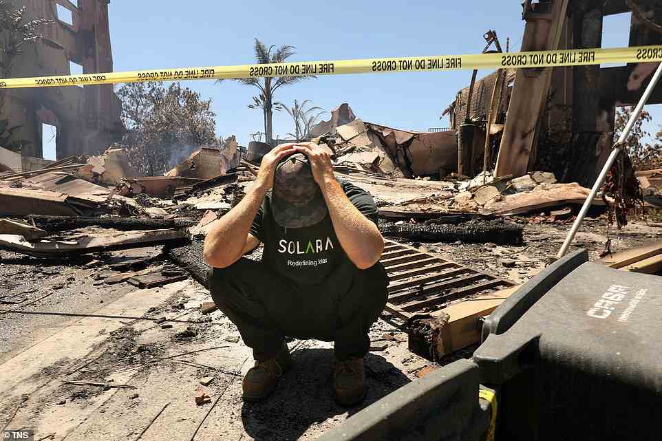 Matthew Vogel, 39, in front of his parents home, where he grew up, in the Coronado Pointe neighborhood. It was completely destroyed the previous night