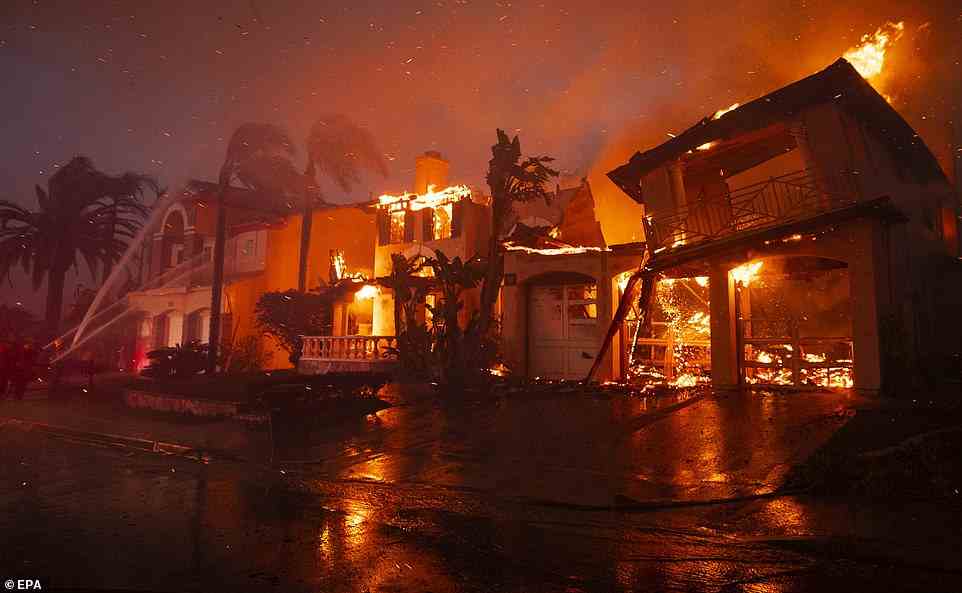 Multimillion dollar mansions went up in flames in California on Wednesday as a fast-moving brush fire engulfed luxury properties overlooking the Pacific