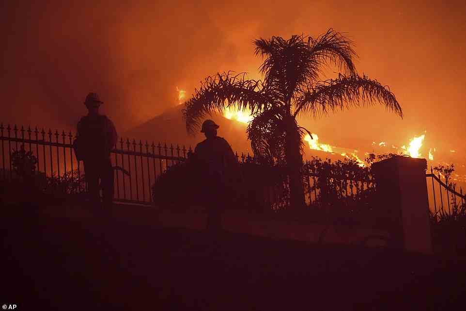 Firefighters were trying on Wednesday night to contain the Coastal Fire and save as many homes as they could