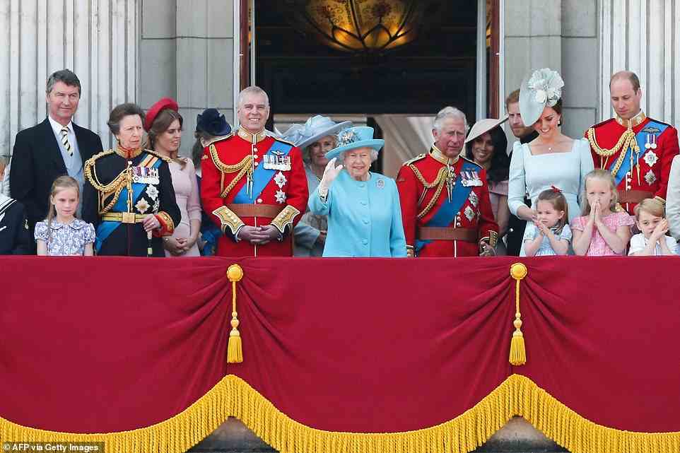 Huge events are taking place across the country to celebrate the Queen 's 70-year reign. Pictured. standing on the balcony, members of the Royal Family, left to right: Vice Admiral Timothy Laurence; Princess Anne; Prince Andrew; Camilla Duchess of Cornwall; Queen Elizabeth II; Prince Charles; Prince Harry; Meghan, Duchess of Sussex; Catherine, Duchess of Cambridge (with Princess Charlotte and Prince George) and Prince William