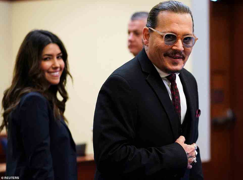 Johnny Depp and his attorney were all smiles as they walked into court in Virginia's Fairfax County on Wednesday