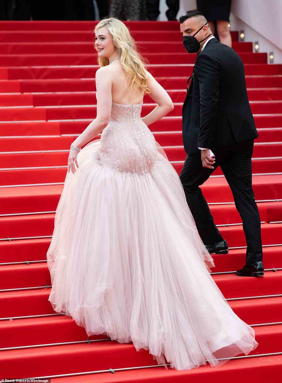 Elle of the ball! The actress looked every inch the Hollywood Princess as she ascended the carpeted stairs