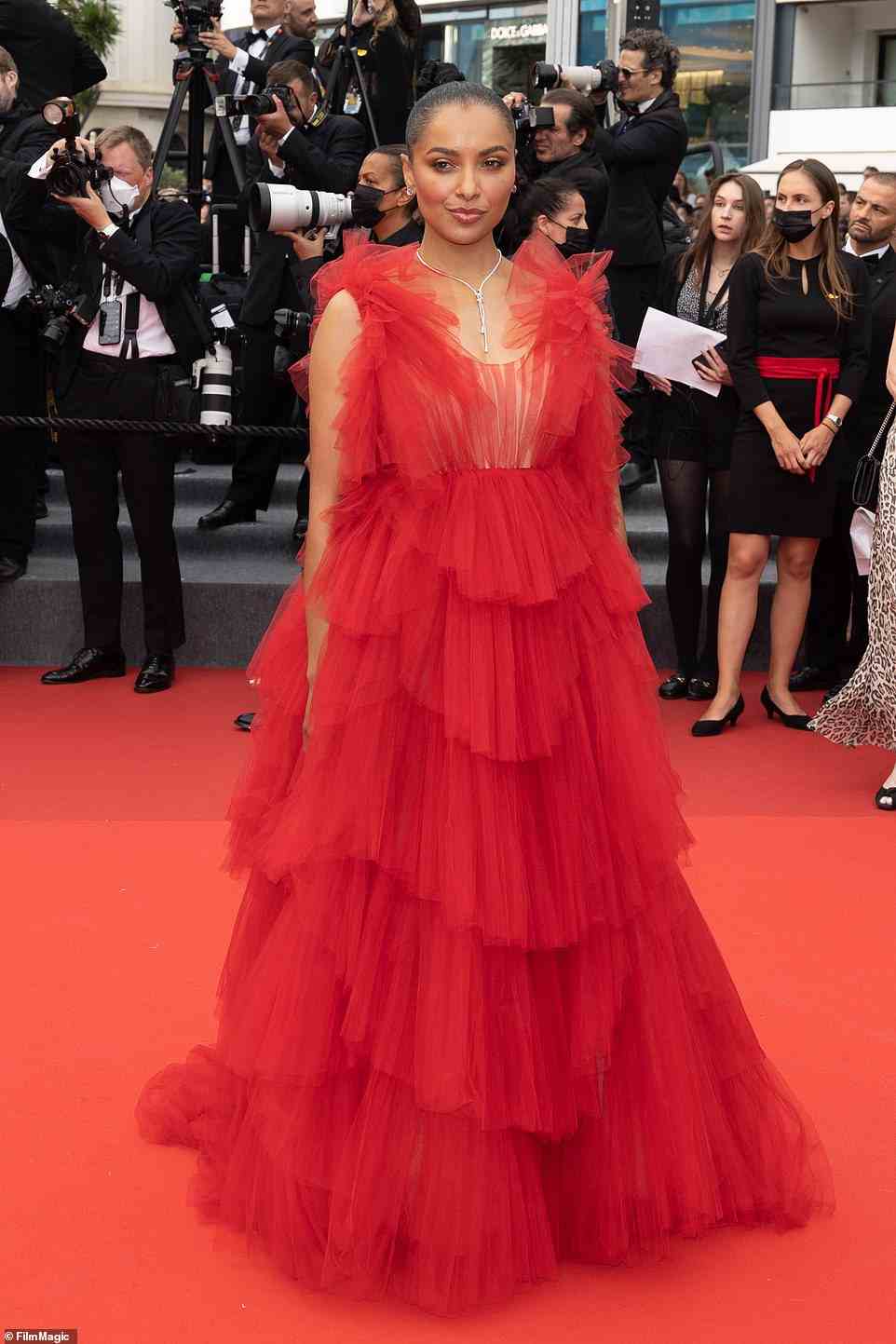 Lady in red: Kat Graham looked gorgeous in a dramatic red layered tulle dress