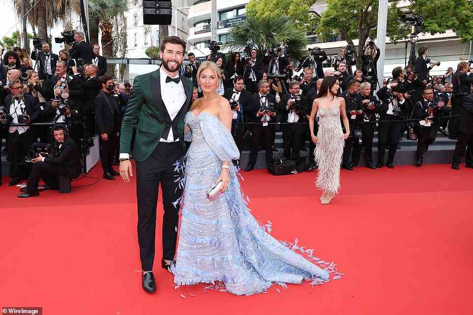 That's how it's done: Hofit looked lovely as she posed alongside Alvaro Nunez, who looked suave in an emerald green blazer