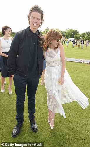 Will Poulter (L) and Ophelia Lovibond attend day one of the Audi Polo Challenge at Coworth Park