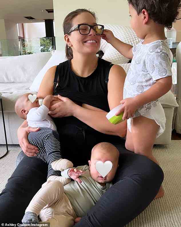 Opening up: The TV presenter also revealed that she had a miscarriage in February 2021, one year after the birth of her first son, Isaac, now two. She is pictured with her three sons