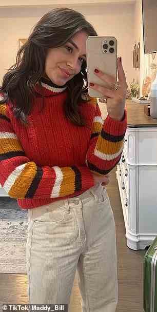 Maddy also tried on a silky, button-down shirt and a yellow and red striped, turtleneck sweater (pictured)