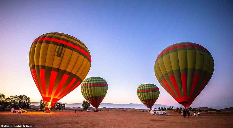 Let there be flight: Sarah soared over the foothills of the Atlas Mountains in a hot-air balloon. She notes you have to set off 'horribly early' to catch the sunrise
