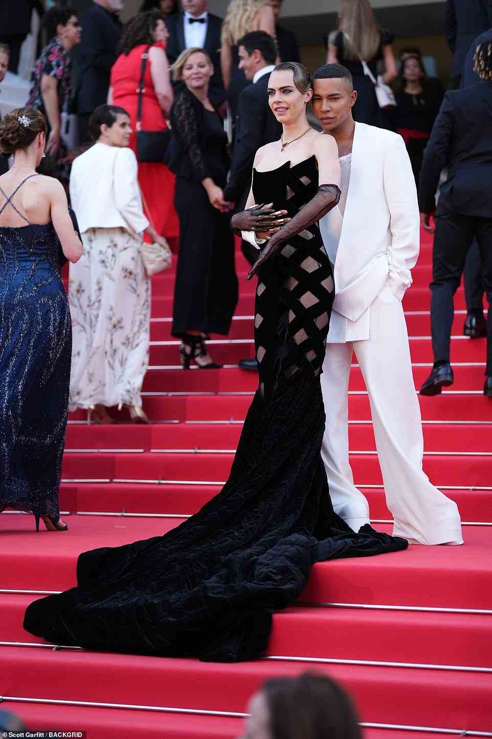 Incredible: Meanwhile, Cara, 29, exuded elegance in a black fitted gown, that accentuated her slender physique