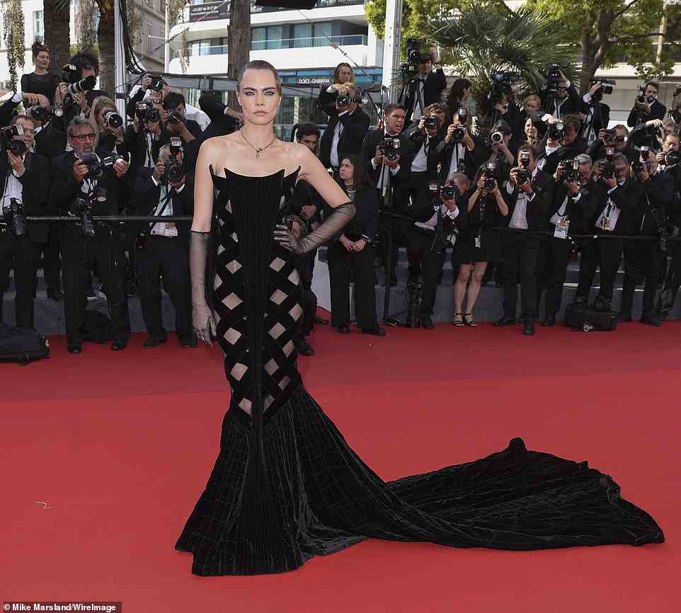Mermaid: Her mermaid-style outfit flared out at the bottom, and flowed into a long velvet train that trailed behind the actress on the carpet