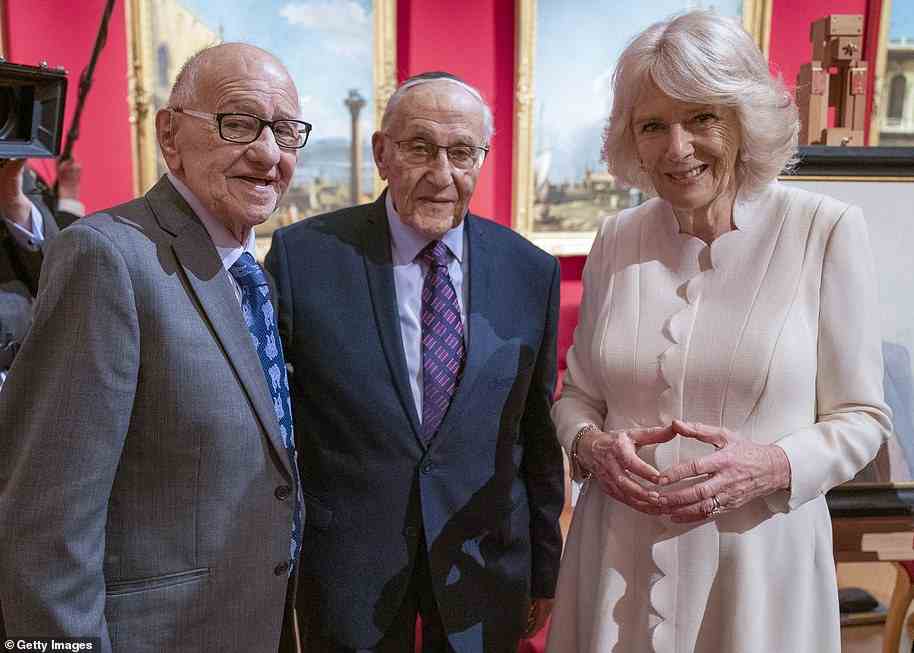 Camilla posed with Holocaust survivors Zigi Shipper and Manfred as their portraits were unveiled on Monday as part of an exhibition to mark Holocaust Memorial Day