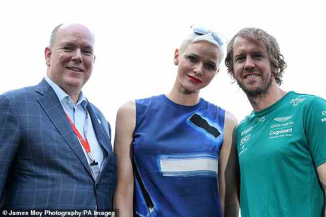 Charlene recently returned to Monaco and was seen last month with her children and husband for the first since November after spending time in treatment facility for 'exhaustion'. The couple are pictured with Sebastian Vettel