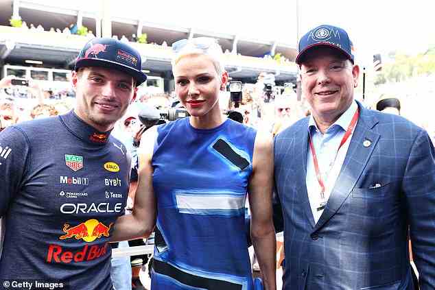 Max Verstappen of the Netherlands and Oracle Red Bull Racing, Princess Charlene of Monaco and Prince Albert of Monaco pose for a photo prior to qualifying ahead of the F1 Grand Prix of Monaco