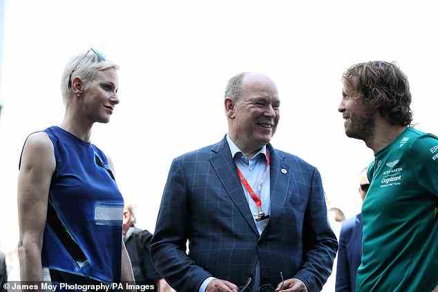 Princess Charlene of Monaco with HSH Prince Albert of Monaco and Sebastian Vettel