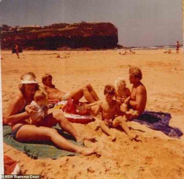 Chris Dawson (above with his twin Paul and their families on the beach in the 1970s had his clothes 'always pristine in neat rows, colour-coded and typed' but when he found an item 'wasn't perfectly ironed' dumped clothes on the bed and told Lyn to do it again