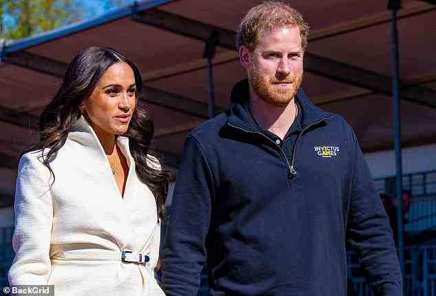 Netflix has dropped Meghan Markle's animated series as part of a wave of cutbacks prompted by the streaming service's drop in subscribers. Markle and Prince Harry are pictured at a track and field event at the Invictus Games in The Hague, Netherlands on April 17, 2022